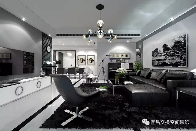 客廳設計  黑色地毯搭配黑色皮質沙發，搭配現代化的吊燈，展現出后現代風格在追求現代化潮流的同時，將傳統的典雅和現代的新穎相融合，創造出融合時尚與典雅的獨特設計。